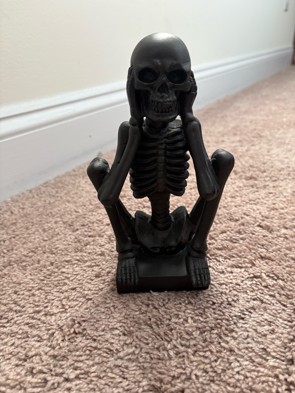 Decorative Black Sitting Skeleton